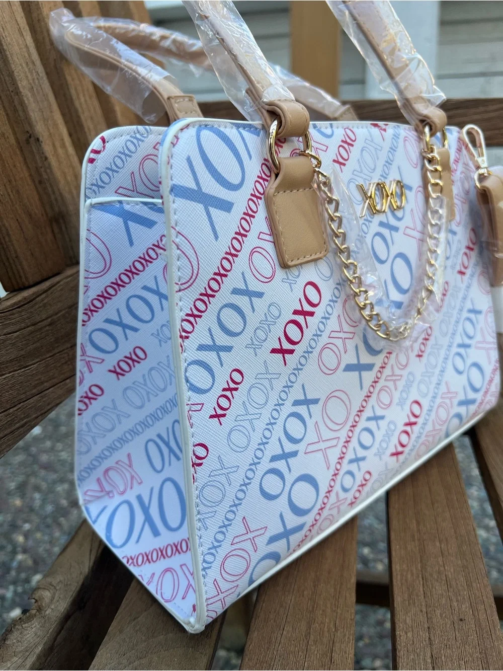 XOXO White Satchel with Blue and Red Logo Print and Tan Trims